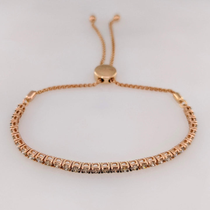 14K ROSE 1.95 CARAT TOTAL WEIGHT SI2 BROWN/ ROUND (33) BOLO ESTATE BRACELET 8.2 GRAMS