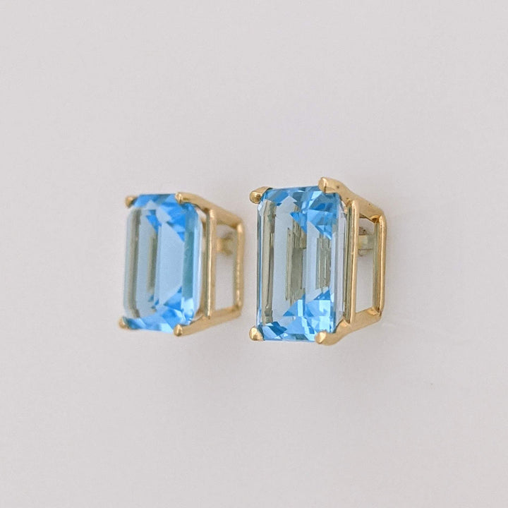 14K BLUE TOPAZ EMERALD CUT 7X9 ESTATE STUD EARRINGS 2.2 GRAMS