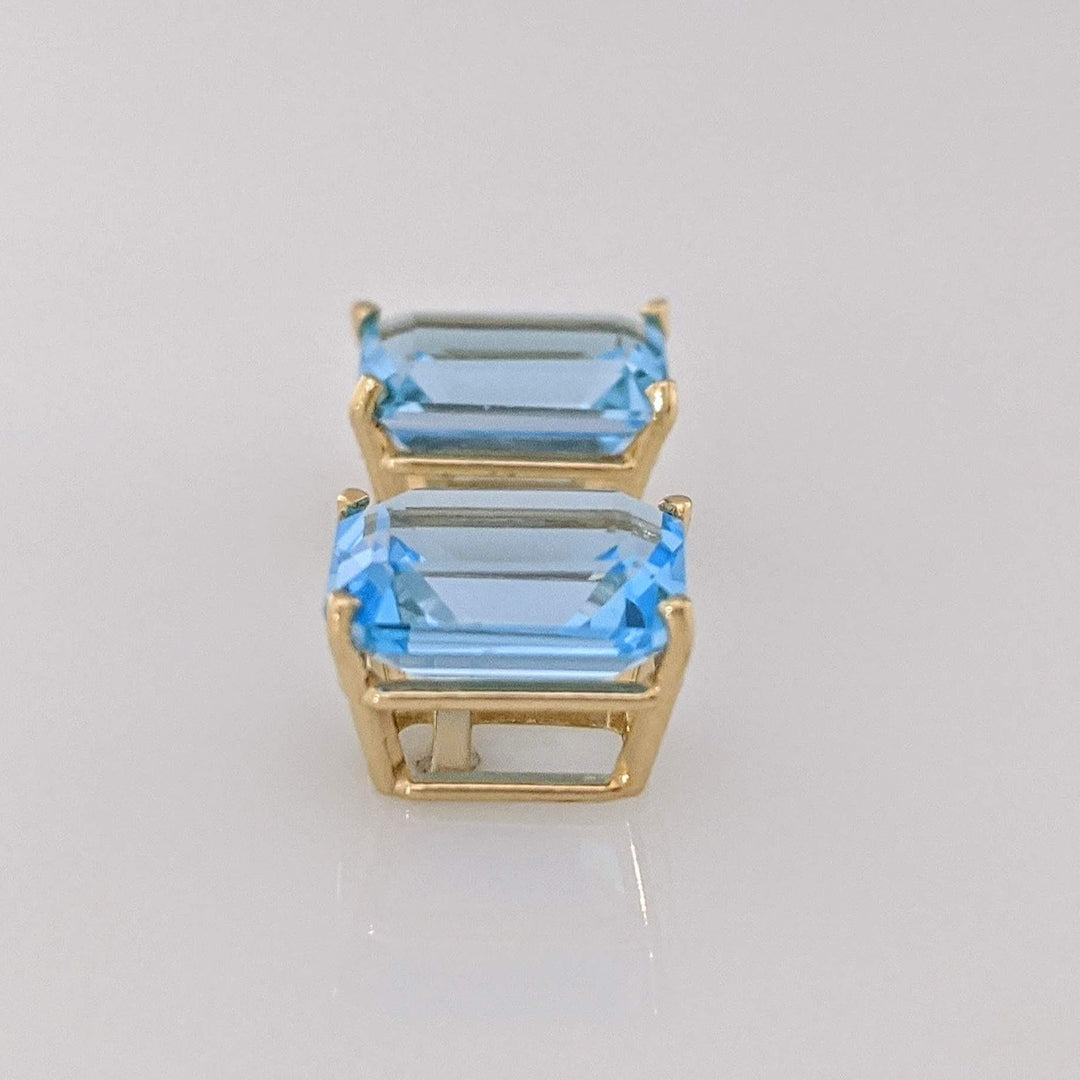 14K BLUE TOPAZ EMERALD CUT 7X9 ESTATE STUD EARRINGS 2.2 GRAMS