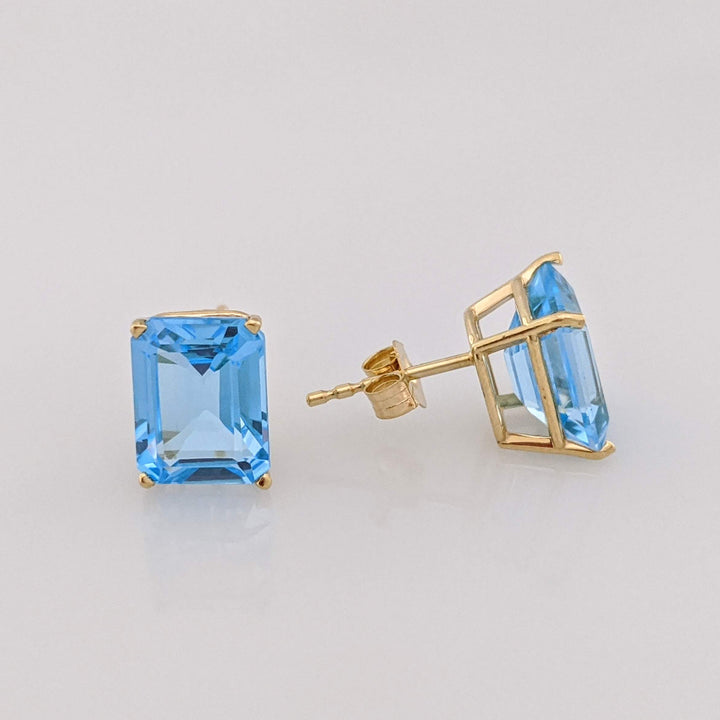 14K BLUE TOPAZ EMERALD CUT 7X9 ESTATE STUD EARRINGS 2.2 GRAMS