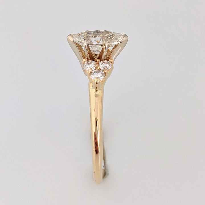 14K 1.36 CARAT TOTAL WEIGHT I1 K DIAMOND MARQUISE WITH (6) ROUND MELEE ESTATE RING 3.0 GRAMS