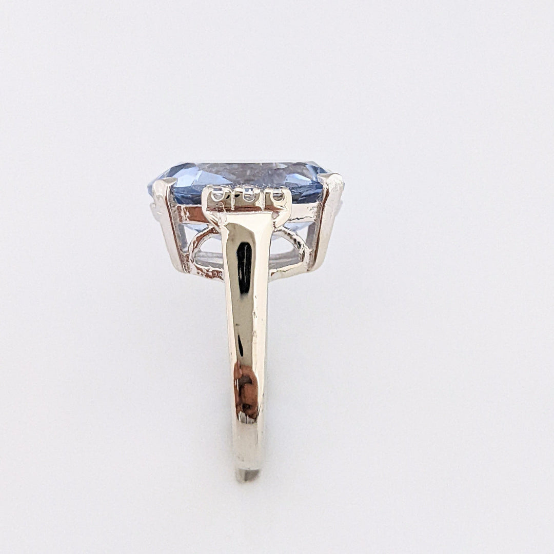 14K WHITE BLUE TOPAZ OVAL 12.5X18 WITH (6) DIAMOND ROUNDS .18 CARAT TOTAL WEIGHT ESTATE RING 10.7 GRAMS