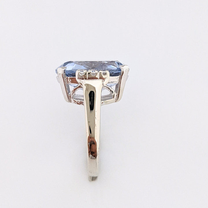 14K WHITE BLUE TOPAZ OVAL 12.5X18 WITH (6) DIAMOND ROUNDS .18 CARAT TOTAL WEIGHT ESTATE RING 10.7 GRAMS