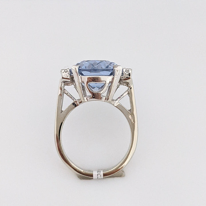14K WHITE BLUE TOPAZ OVAL 12.5X18 WITH (6) DIAMOND ROUNDS .18 CARAT TOTAL WEIGHT ESTATE RING 10.7 GRAMS