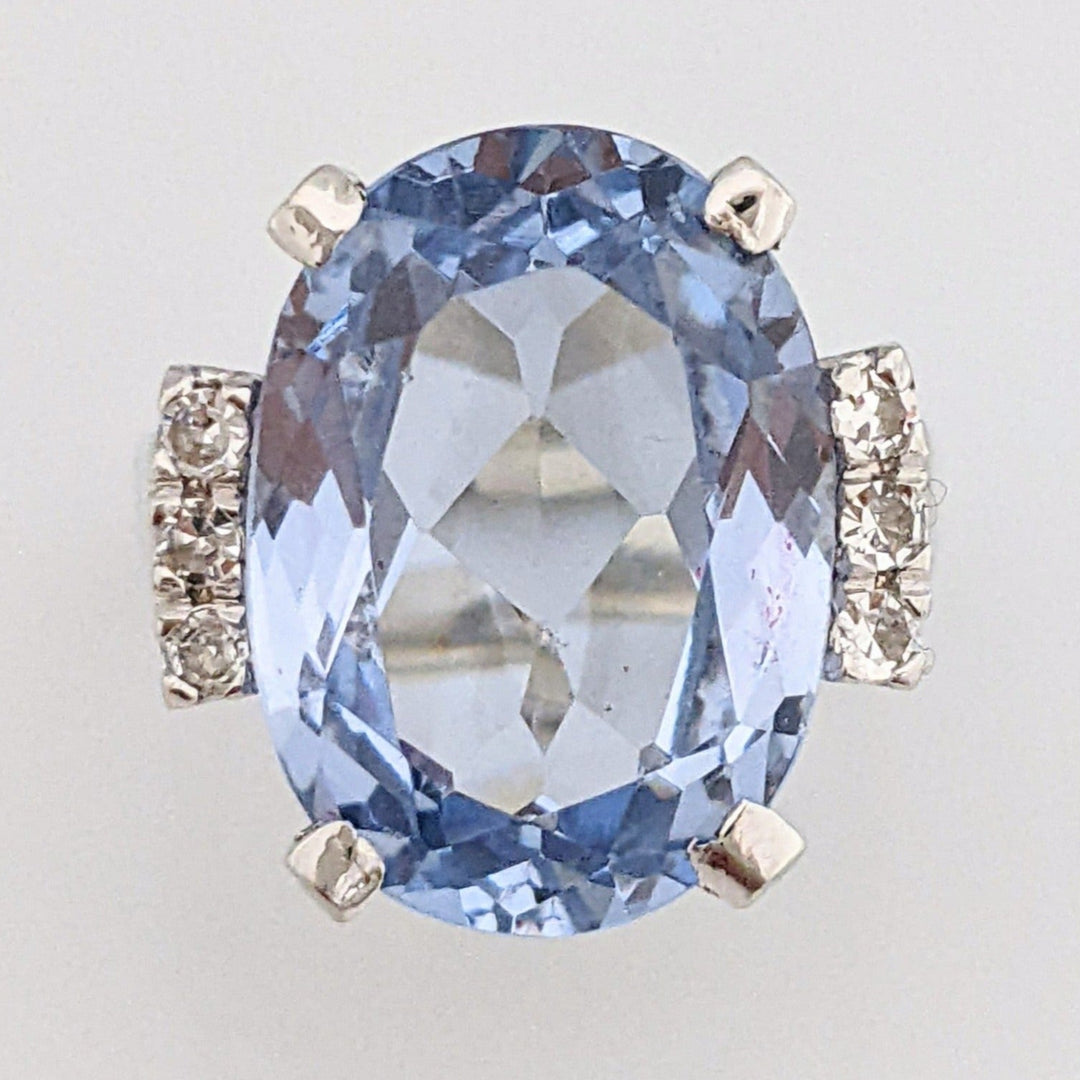 14K WHITE BLUE TOPAZ OVAL 12.5X18 WITH (6) DIAMOND ROUNDS .18 CARAT TOTAL WEIGHT ESTATE RING 10.7 GRAMS