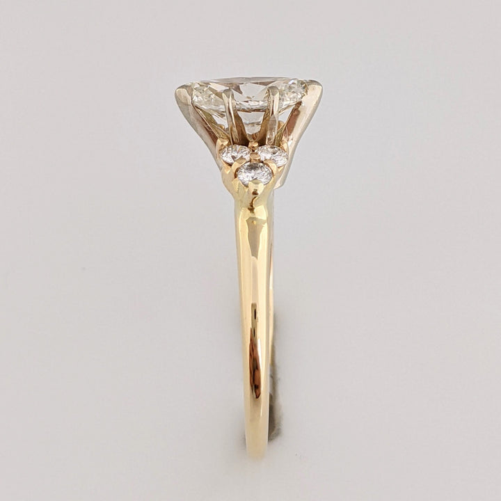 14K 1.36 CARAT TOTAL WEIGHT I1 K DIAMOND MARQUISE WITH (6) ROUND MELEE ESTATE RING 3.0 GRAMS