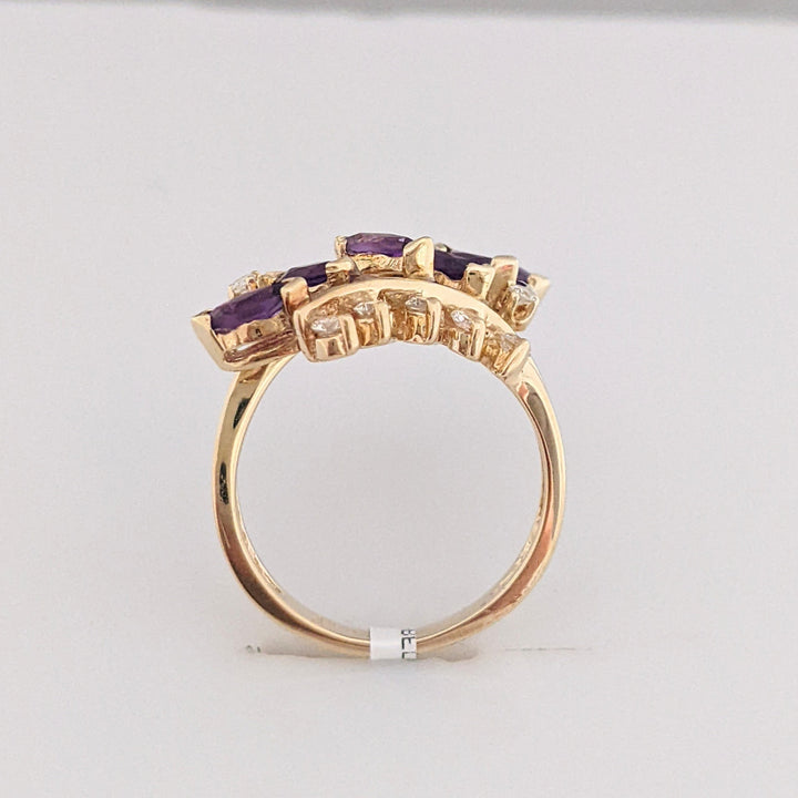 14K AMETHYST MARQUISE (6) 2.5X5 WITH 12 DIAMONDS 3.9 GRAMS