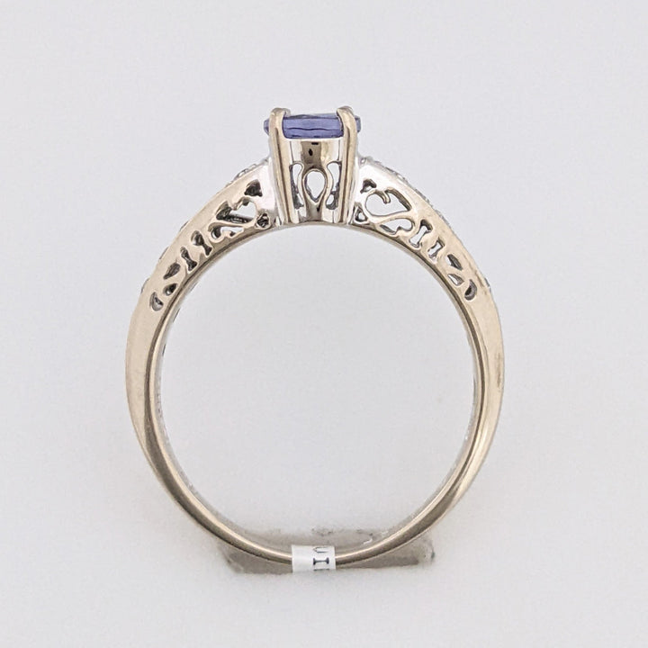 18K WHITE TANZANITE ROUND .65 CARAT TOTAL WITH .14 DIAMOND TOTAL WEIGHT (10) ROUND ESTATE RING 3.8 GRAMS