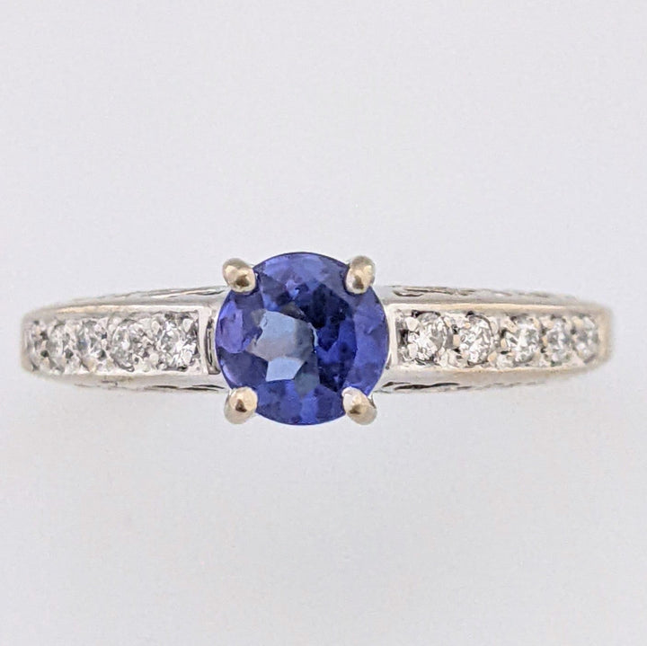 18K WHITE TANZANITE ROUND .65 CARAT TOTAL WITH .14 DIAMOND TOTAL WEIGHT (10) ROUND ESTATE RING 3.8 GRAMS