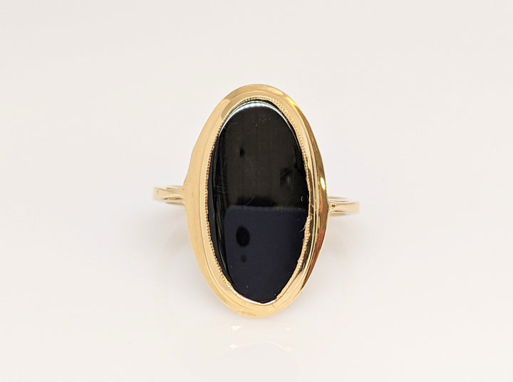 14K ONYX OVAL 8X19 WITH GOLD TRIM ESTATE RING 2.9 GRAMS