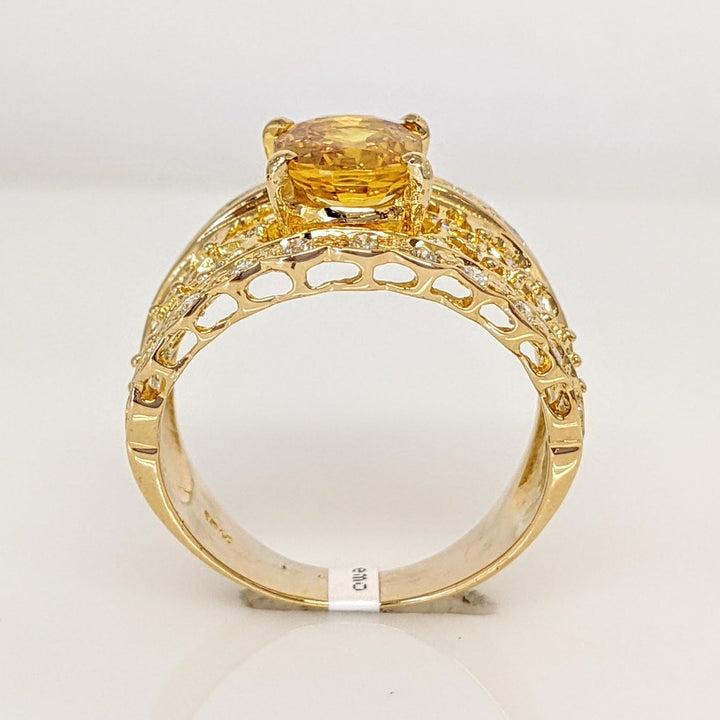 18K YELLOW LAB-CREATED SAPPHIRE OVAL 7X9 WITH .25 DIAMOND TOTAL WEIGHT ESTATE RING 5.3 GRAMS