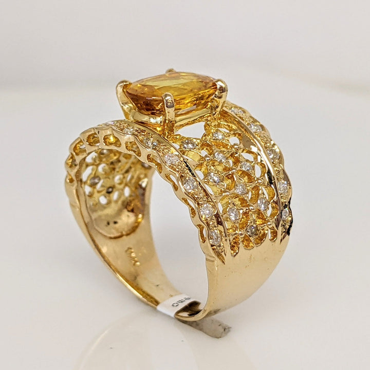 18K YELLOW LAB-CREATED SAPPHIRE OVAL 7X9 WITH .25 DIAMOND TOTAL WEIGHT ESTATE RING 5.3 GRAMS