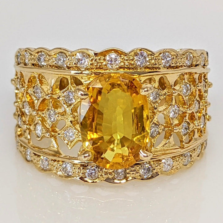 18K YELLOW LAB-CREATED SAPPHIRE OVAL 7X9 WITH .25 DIAMOND TOTAL WEIGHT ESTATE RING 5.3 GRAMS