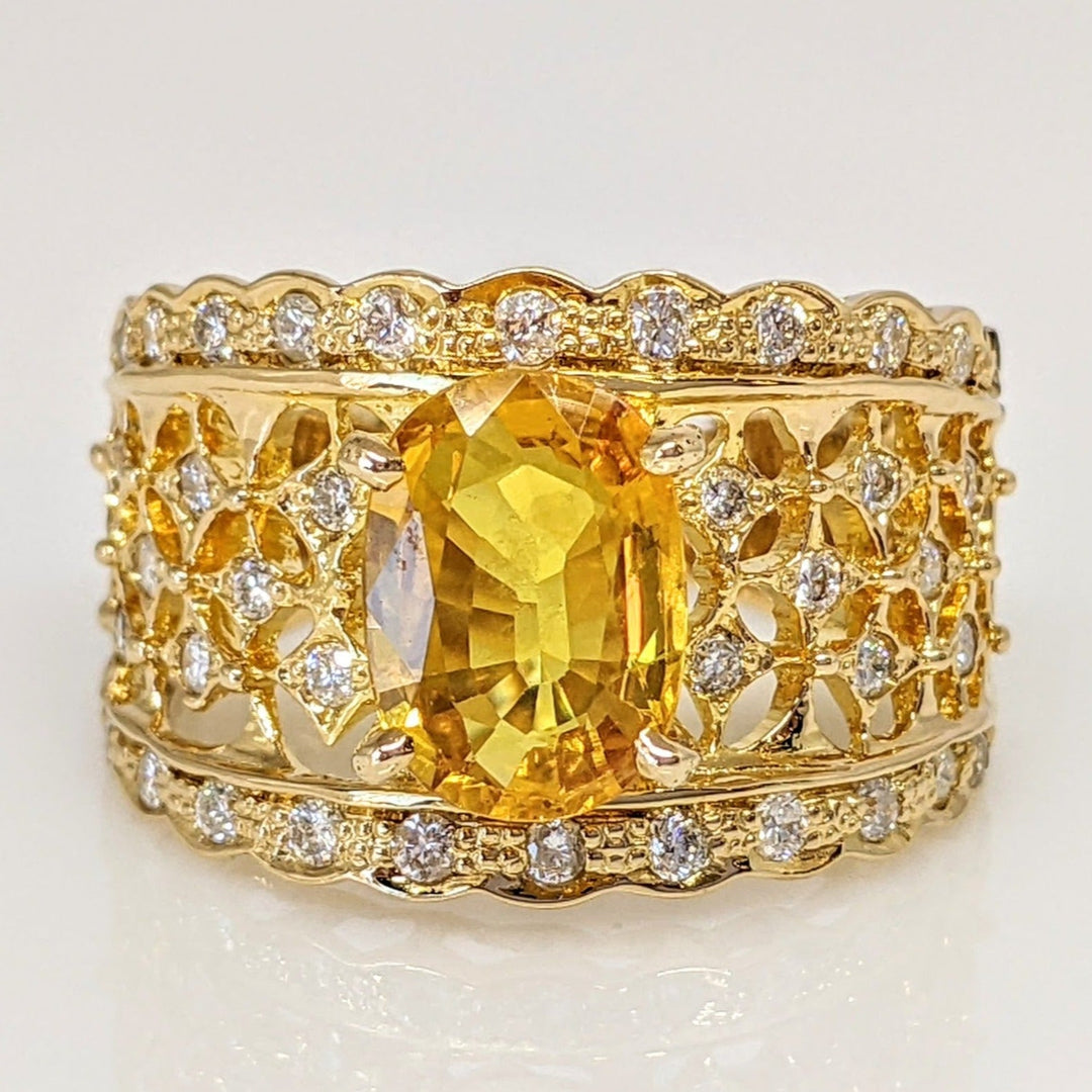 18K YELLOW LAB-CREATED SAPPHIRE OVAL 7X9 WITH .25 DIAMOND TOTAL WEIGHT ESTATE RING 5.3 GRAMS
