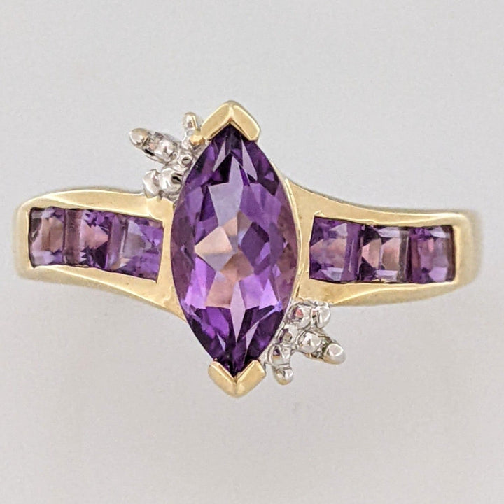 10K AMETHYST MARQUISE 5X10 WITH (6) PRINCESS CUT AMETHYST AND (2) MELEE ESTATE RING 2.6 GRAMS