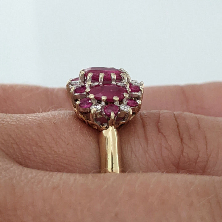 14K RUBY OVAL (1) 4X6 (2) 3X5 WITH .10 DIAMOND TOTAL WEIGHT (2) ESTATE RING 4.3 GRAMS ADJUSTABLE