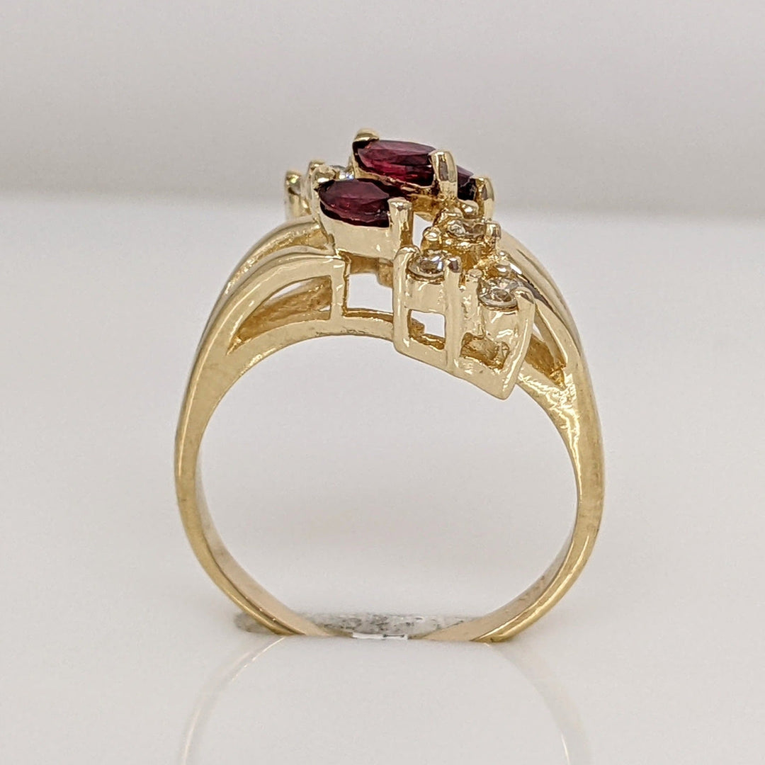 14K RUBY MARQUISE (3) 2.5X4 WITH .12 DIAMOND TOTAL WEIGHT I1 I (6) ROUND ESTATE RING 3.1 GRAMS