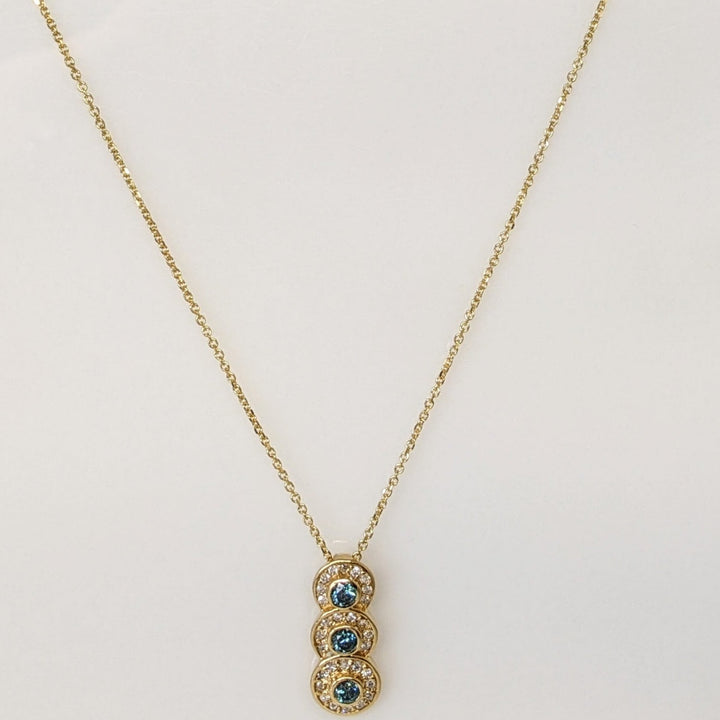 14K .65 CARAT TOTAL WEIGHT I1-I2 BLUE (3) WHITE (29) BEZEL ESTATE PENDANT & CHAIN 3.6 GRAMS