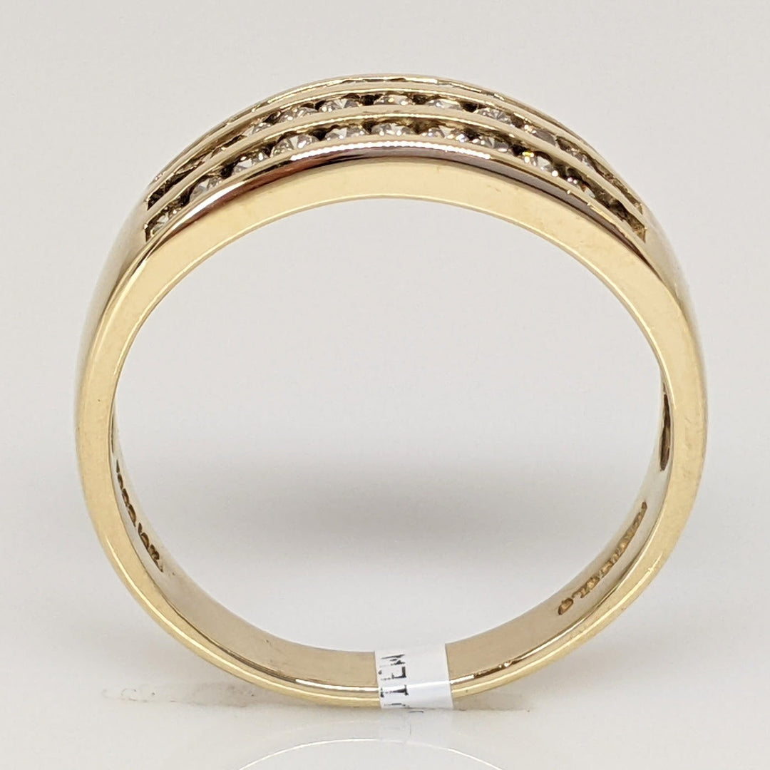 10K .50 CARAT TOTAL WEIGHT I1 CHAMPAGNE (33) THREE- ROW ESTATE CHANNEL SET BAND 3.1 GRAMS