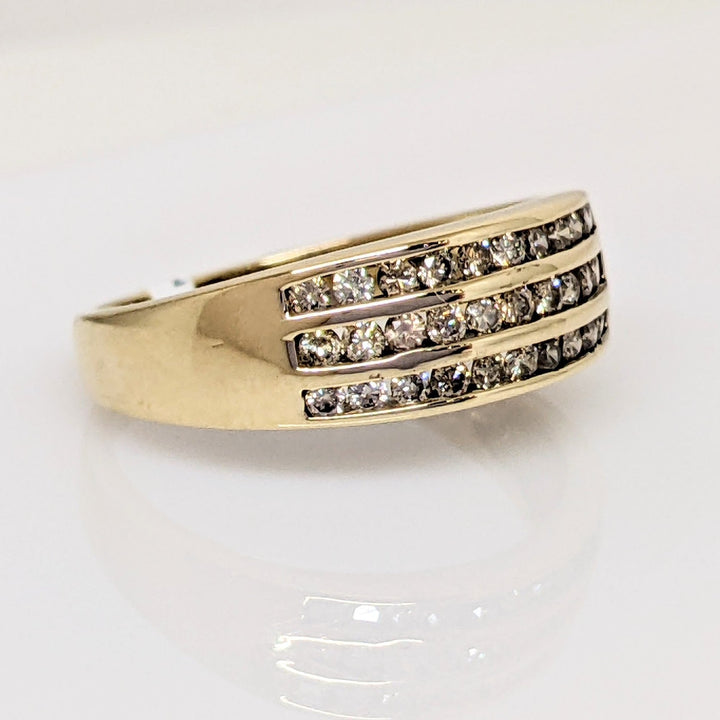 10K .50 CARAT TOTAL WEIGHT I1 CHAMPAGNE (33) THREE- ROW ESTATE CHANNEL SET BAND 3.1 GRAMS