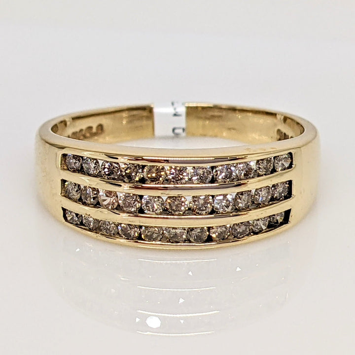 10K .50 CARAT TOTAL WEIGHT I1 CHAMPAGNE (33) THREE- ROW ESTATE CHANNEL SET BAND 3.1 GRAMS
