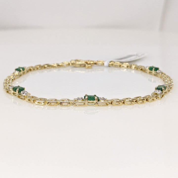 10K EMERALD OVAL (5) 3X5 WITH (2) MELEE ESTATE BRACELET 5.6 GRAMS
