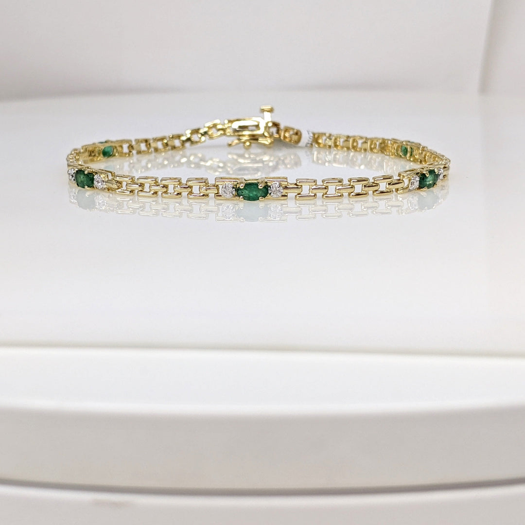 10K EMERALD OVAL (5) 3X5 WITH (2) MELEE ESTATE BRACELET 5.6 GRAMS
