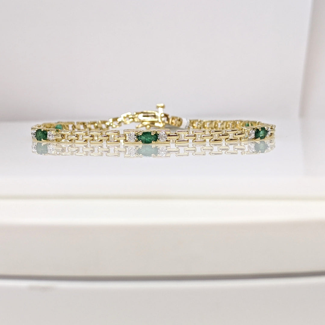 10K EMERALD OVAL (5) 3X5 WITH (2) MELEE ESTATE BRACELET 5.6 GRAMS