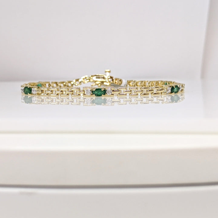 10K EMERALD OVAL (5) 3X5 WITH (2) MELEE ESTATE BRACELET 5.6 GRAMS