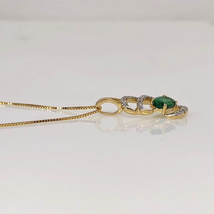 14K EMERALD OVAL 4X6 (3) WITH MELEE SWIRL ESTATE PENDANT, CHAIN, AND EARRING SET 5.1 GRAMS