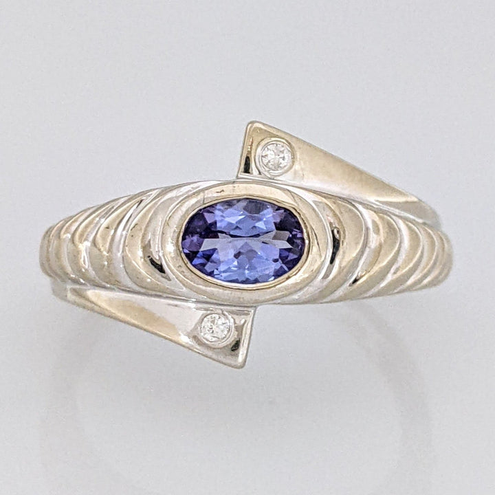 14K WHITE TANZANITE OVAL 4X6 WITH (2) MELEE RIBBED ESTATE RING 3.3 GRAMS