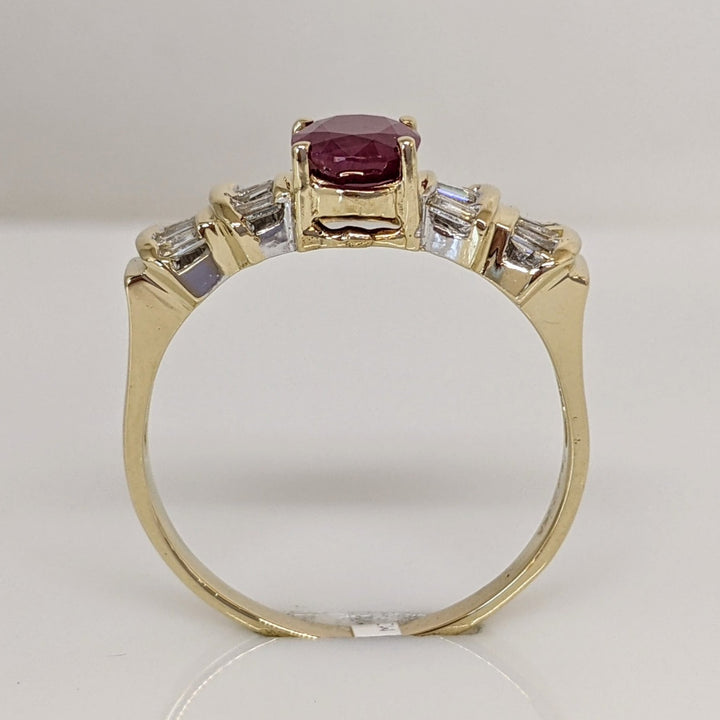 14K RUBY OVAL 6X8 "C" WITH .48 DIAMOND TOTAL WEIGHT BAGUETTE (16) ESTATE RING 4.2 GRAMS