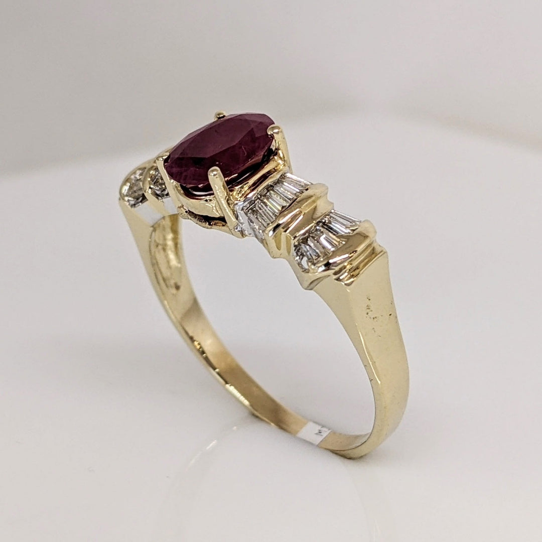 14K RUBY OVAL 6X8 "C" WITH .48 DIAMOND TOTAL WEIGHT BAGUETTE (16) ESTATE RING 4.2 GRAMS