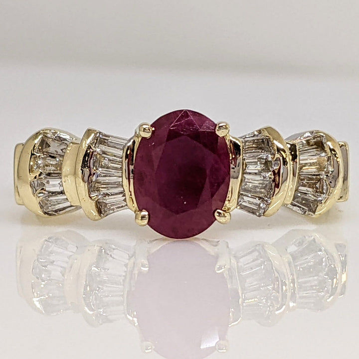 14K RUBY OVAL 6X8 "C" WITH .48 DIAMOND TOTAL WEIGHT BAGUETTE (16) ESTATE RING 4.2 GRAMS