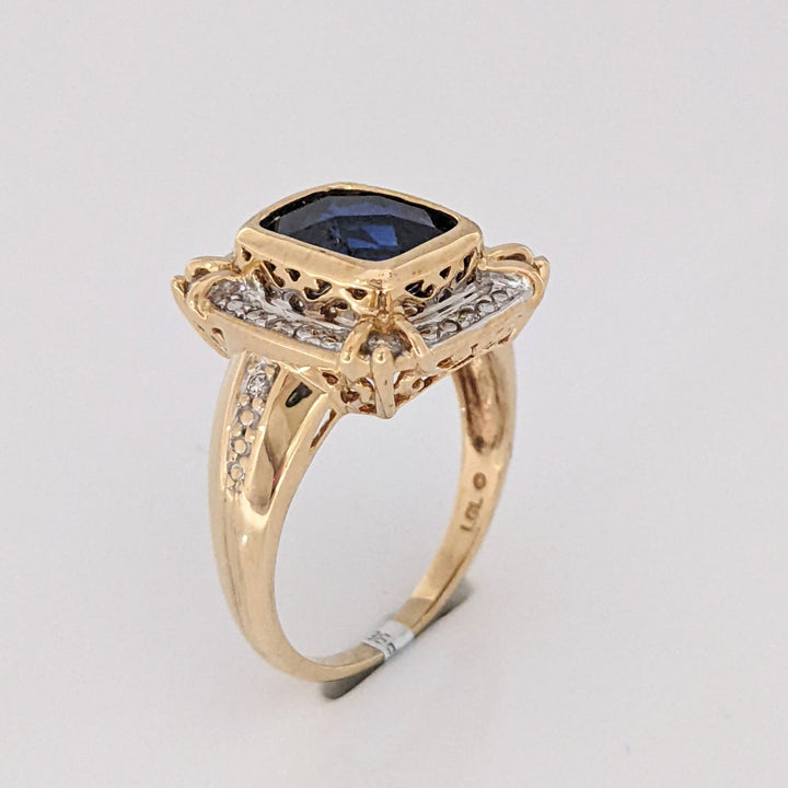 10K LAB-CREATED SAPPHIRE EMERALD CUT 6.5X8.5 WITH .16 DIAMOND TOTAL WEIGHT ESTATE RING 5.2 GRAMS
