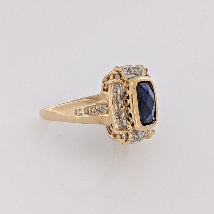 10K LAB-CREATED SAPPHIRE EMERALD CUT 6.5X8.5 WITH .16 DIAMOND TOTAL WEIGHT ESTATE RING 5.2 GRAMS