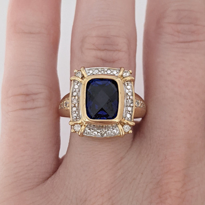 10K LAB-CREATED SAPPHIRE EMERALD CUT 6.5X8.5 WITH .16 DIAMOND TOTAL WEIGHT ESTATE RING 5.2 GRAMS