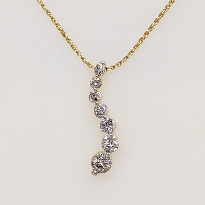 14K.44 CARAT TOTAL WEIGHT I1 I DIAMOND ROUND (7) ESTATE JOURNEY PENDANT & CHAIN 3.5 GRAMS