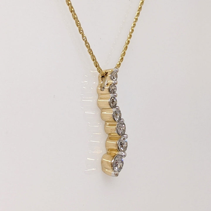 14K.44 CARAT TOTAL WEIGHT I1 I DIAMOND ROUND (7) ESTATE JOURNEY PENDANT & CHAIN 3.5 GRAMS