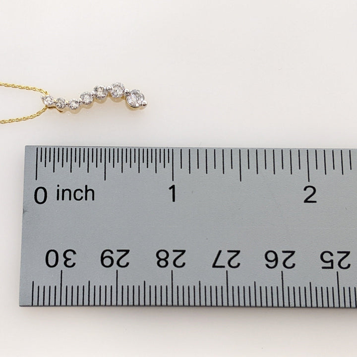 14K.44 CARAT TOTAL WEIGHT I1 I DIAMOND ROUND (7) ESTATE JOURNEY PENDANT & CHAIN 3.5 GRAMS