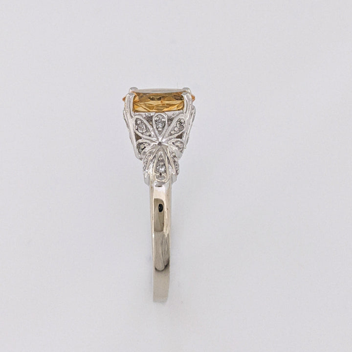 10K WHITE CITRINE OVAL 7X9 WITH MELEE ESTATE RING 3.8 GRAMS