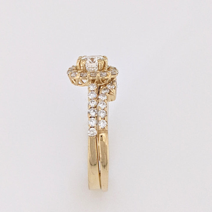 14K .60 CARAT TOTAL SI1 F DIAMOND ROUND WITH .47 DIAMOND TOTAL WEIGHT MOUNTING AND .23 DIAMOND TOTAL WEIGHT BAND ESTATE SET 4.5 GRAMS