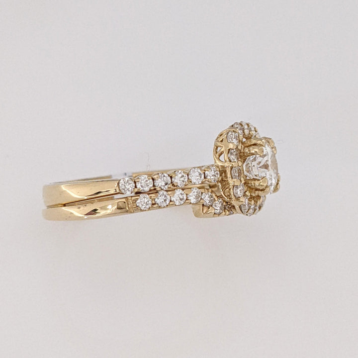14K .60 CARAT TOTAL SI1 F DIAMOND ROUND WITH .47 DIAMOND TOTAL WEIGHT MOUNTING AND .23 DIAMOND TOTAL WEIGHT BAND ESTATE SET 4.5 GRAMS