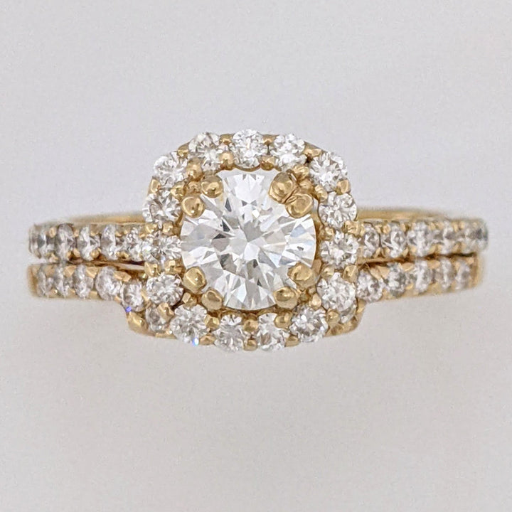 14K .60 CARAT TOTAL SI1 F DIAMOND ROUND WITH .47 DIAMOND TOTAL WEIGHT MOUNTING AND .23 DIAMOND TOTAL WEIGHT BAND ESTATE SET 4.5 GRAMS
