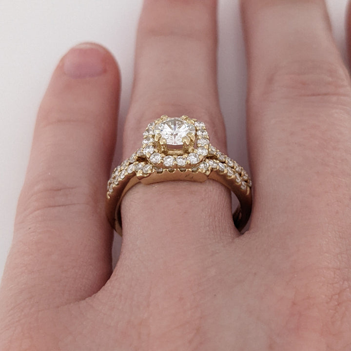 14K .60 CARAT TOTAL SI1 F DIAMOND ROUND WITH .47 DIAMOND TOTAL WEIGHT MOUNTING AND .23 DIAMOND TOTAL WEIGHT BAND ESTATE SET 4.5 GRAMS
