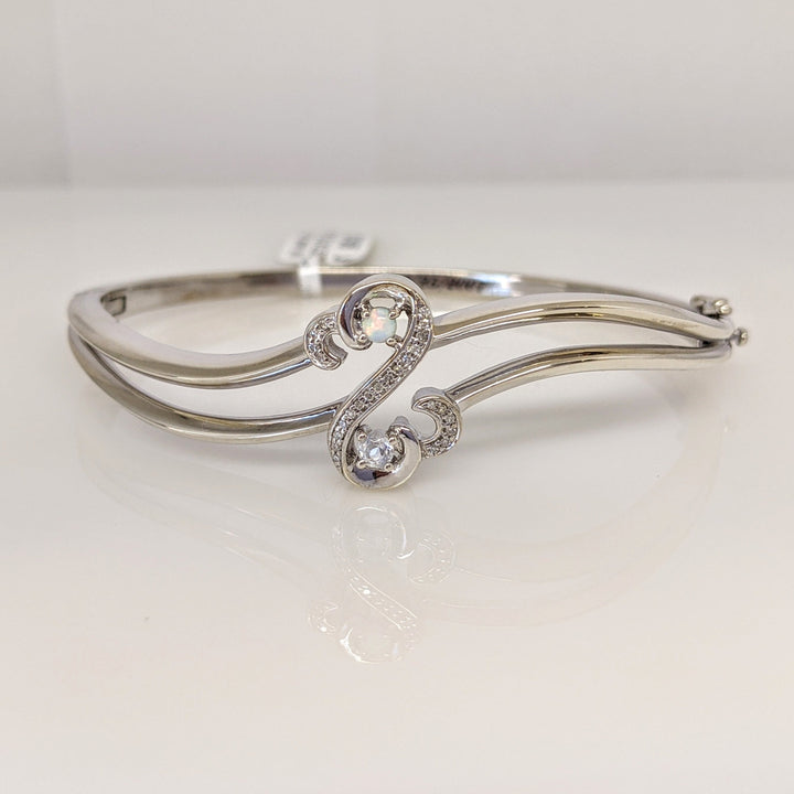 STERLING SILVER "JANE SEYMOUR OPEN HEART" CLEAR STONE/ OPAL ESTATE BANGLE 21.9 GRAMS