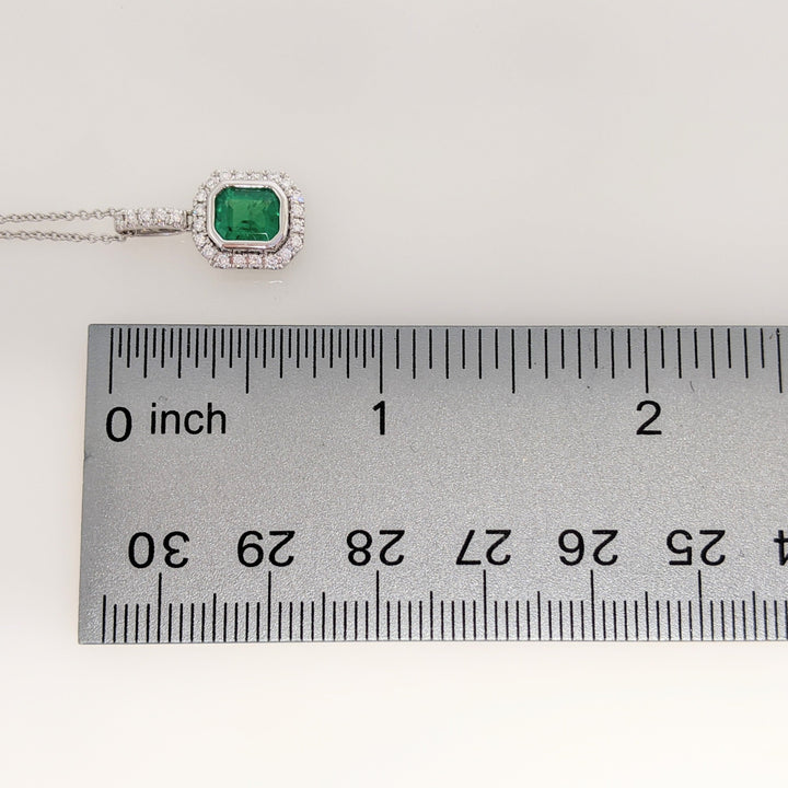 14K WHITE EMERALD .91 CARAT TOTAL EMERALD CUT BEZEL WITH .18 DIAMOND TOTAL WEIGHT ESTATE PENDANT & CHAIN 2.8 GRAMS