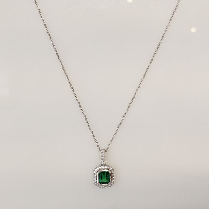 14K WHITE EMERALD .91 CARAT TOTAL EMERALD CUT BEZEL WITH .18 DIAMOND TOTAL WEIGHT ESTATE PENDANT & CHAIN 2.8 GRAMS