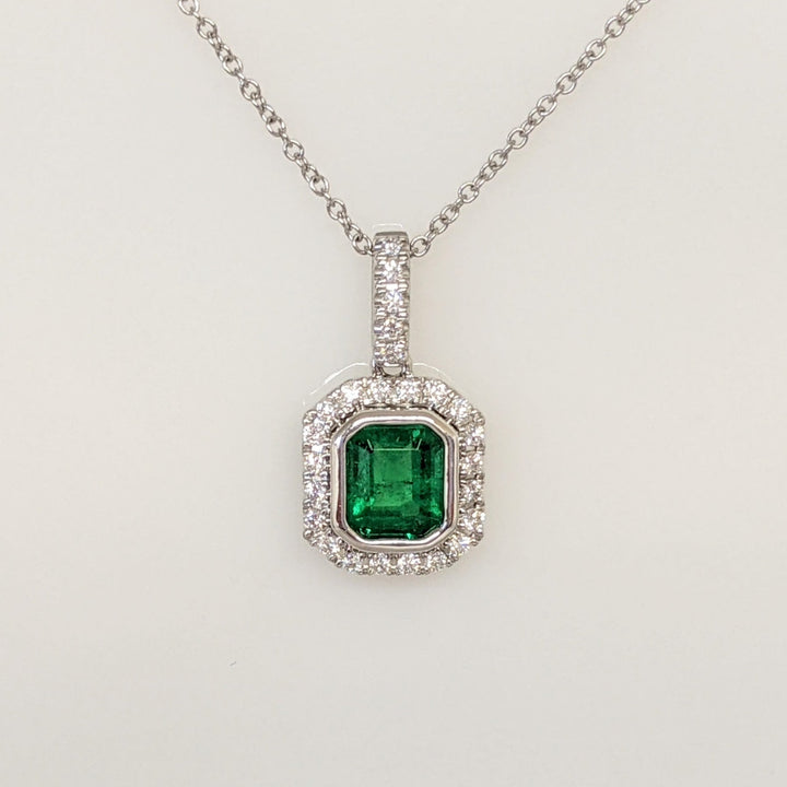 14K WHITE EMERALD .91 CARAT TOTAL EMERALD CUT BEZEL WITH .18 DIAMOND TOTAL WEIGHT ESTATE PENDANT & CHAIN 2.8 GRAMS