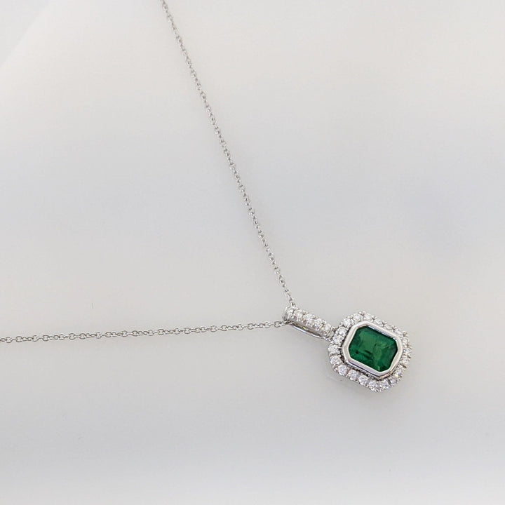 14K WHITE EMERALD .91 CARAT TOTAL EMERALD CUT BEZEL WITH .18 DIAMOND TOTAL WEIGHT ESTATE PENDANT & CHAIN 2.8 GRAMS